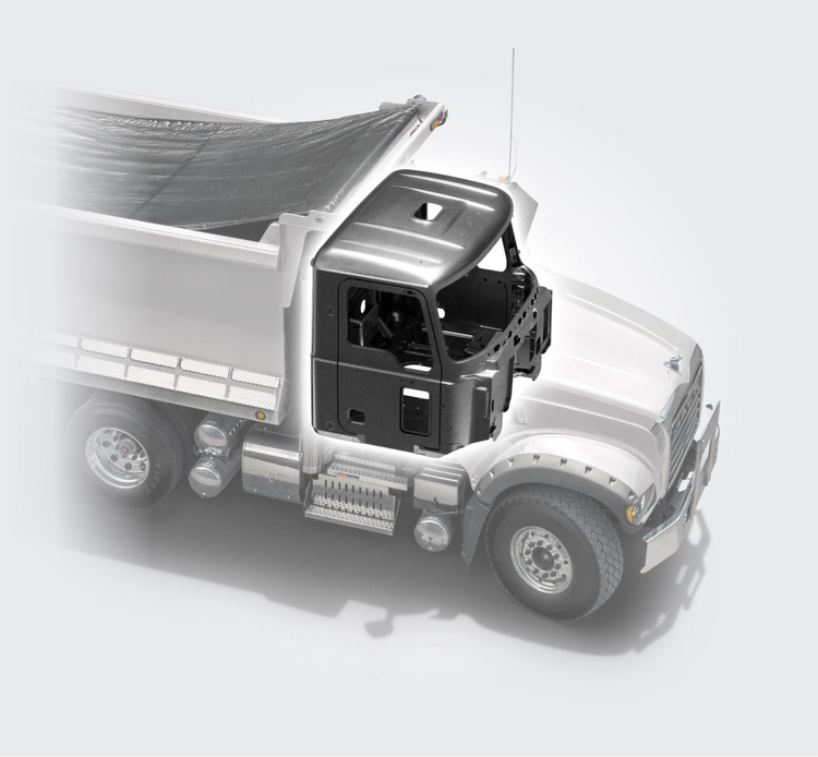 Mack Granite truck with a semi-transparent view highlighting its reinforced steel cab design.