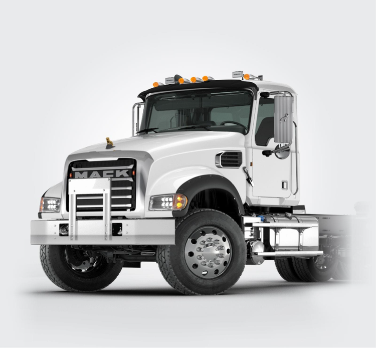 White Mack Granite truck with a bold grille and polished wheels