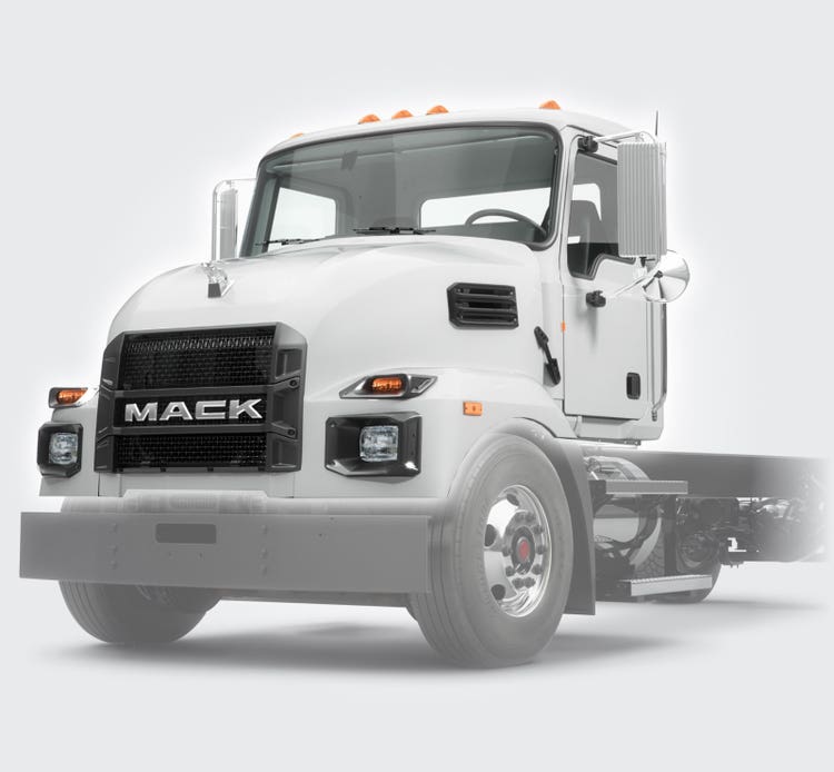 White Mack MD Series truck showcasing its durable front grille.